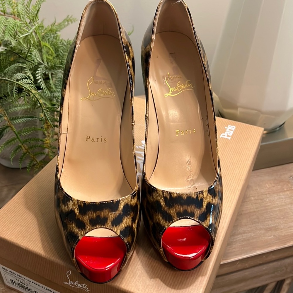 Brown/Red Louboutins.